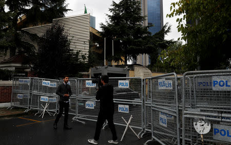 A TV journalist reports outside the Saudi Arabia's consulate in Istanbul, Turkey October 13, 2018. REUTERS/Murad Sezer