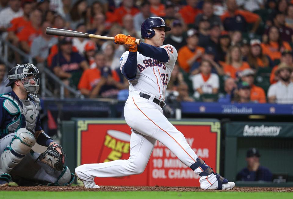 Jul 6, 2023; Houston, Texas, USA; Houston Astros pinch hitter Bligh Madris (26) bats during the seventh inning against the Seattle Mariners at Minute Maid Park.