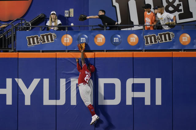 Harper homers, Phils split with Mets after Nola ties K mark