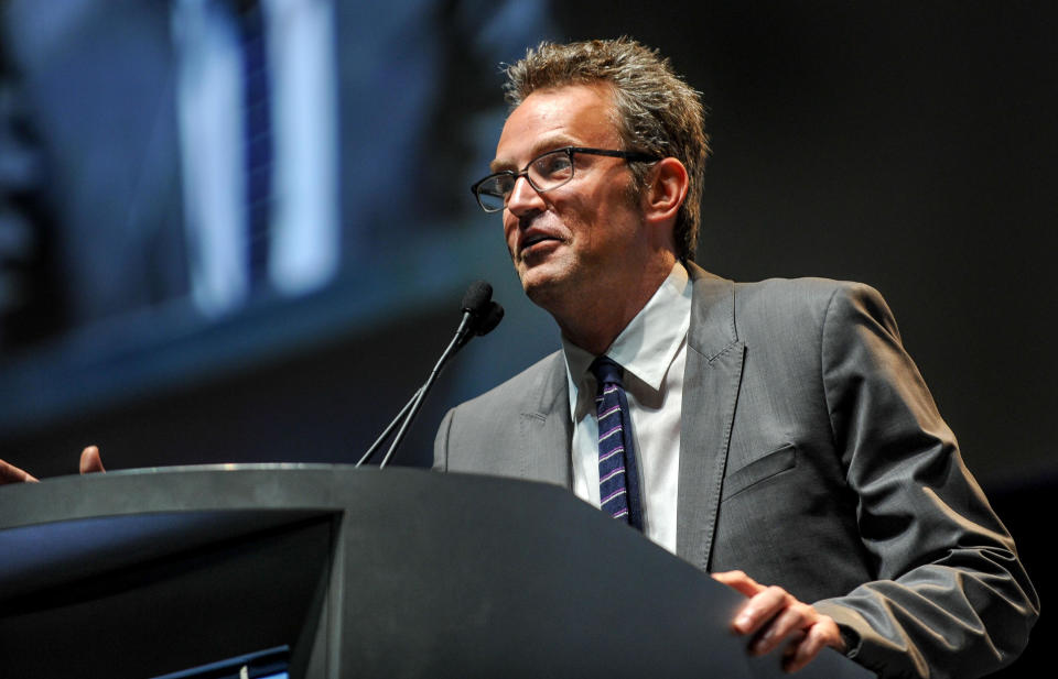 Matthew Perry speaks during the closing ceremony of the National Association of Drug Court Professionals' 20th Annual Training Conference, at the Anaheim Convention Center in Anaheim, Calif., on May 31, 2014. He was an ambassador for the association. / Credit: Eric Reed/AP Images for The National Association of Drug Court Professionals