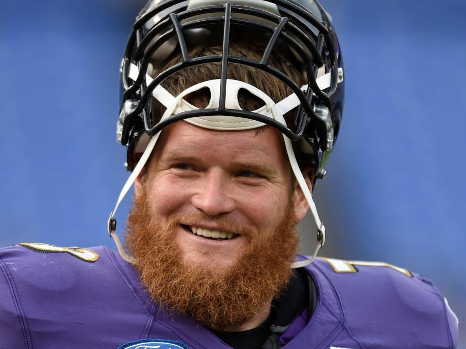 FILE - In this Aug. 1, 2016, file photo, Baltimore Ravens guard Marshal Yanda, right, talks with quarterback Joe Flacco during practice at the NFL football teams training camp in Baltimore. Yanda retired from the NFL on Wednesday, March 11, 2020, with the satisfaction of knowing that he walked away before being kicked out the door. (AP Photo/Gail Burton, File)