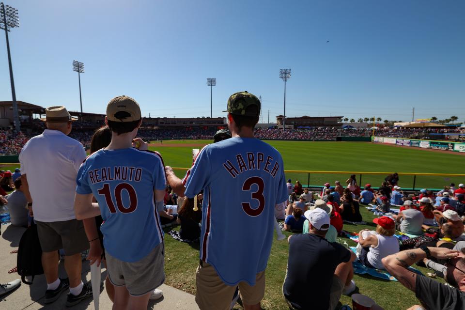 Fans watch at Phillies-Yankees game at BayCare Ballpark.