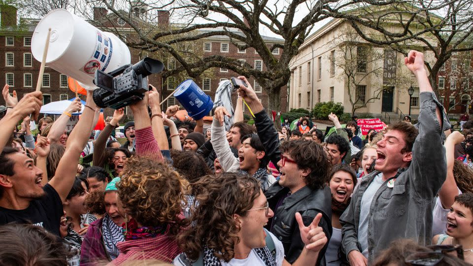 Pro-Palestinian students celebrate reaching a deal with the administration at Brown University, bringing an end to their encampment, in Providence, Rhode Island on April 30, 2024. - Joseph Prezioso/AFP/Getty Images