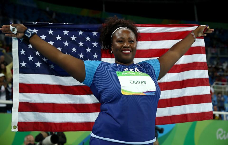 <p>Michelle Carter of the United States celebrates placing first in the Women’s Shot Put Final on Day 7 of the Rio 2016 Olympic Games at the Olympic Stadium on August 12, 2016 in Rio de Janeiro, Brazil. (Photo by Cameron Spencer/Getty Images) </p>