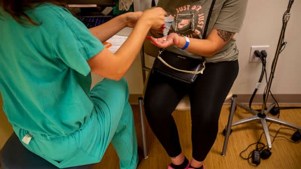 PHOTO: A resident gives a 25-year-old woman medication to terminate her pregnancy  the day before the Supreme Court overturned Roe v. Wade at the Center for Reproductive Health clinic on in Albuquerque, N.M., June 23, 2022. (Los Angeles Times via Getty Images, FILE)