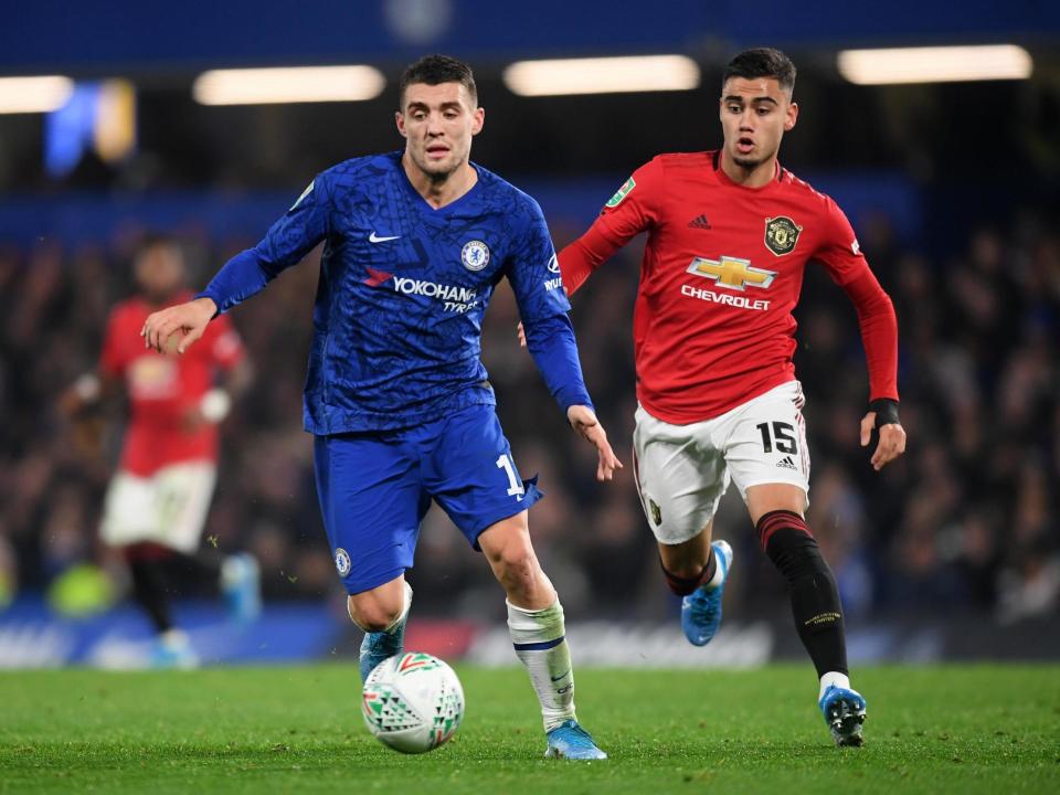 Mateo Kovacic of Chelsea attempts to get away from Andreas Pereira of Manchester United: Getty Images