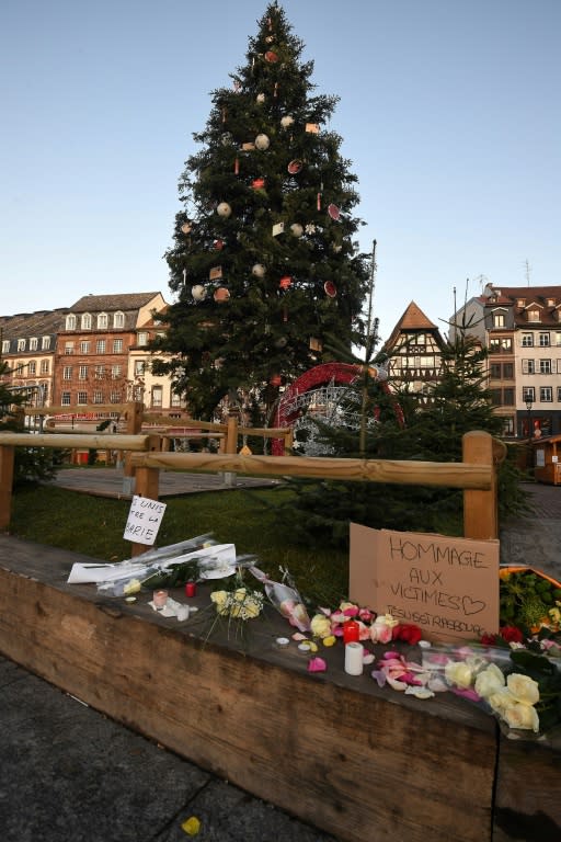 Flowers and candles were placed on Strasbourg's Place Kleber on Wednesday in tribute to the victims of the terror attack at the city's bustling Christmas market