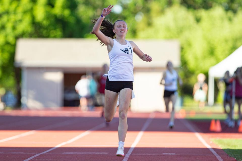 West Salem's Avery Meier celebrates after winning the 1500 meters during the CVC Track and Field District Championships at McCulloch Stadium on Friday, May 10, 2024, in Salem.