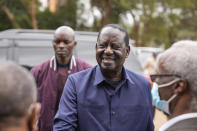 Presidential candidate Raila Odinga arrives to attend Sunday mass in St. Francis church in Nairobi, Kenya, Sunday, Aug. 14, 2022. The race remains close between Odinga and Deputy President William Ruto as the electoral commission physically verifies more than 46,000 results forms electronically transmitted from around the country. (AP Photo/Mosa'ab Elshamy)