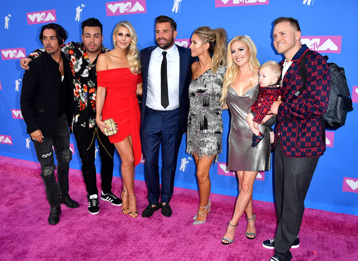 From right, Spencer Pratt and Heidi Montag Pratt with son Gunner, Audrina Patridge, Jason Wahler, an unidentified woman, Frankie Delgado, and Justin 