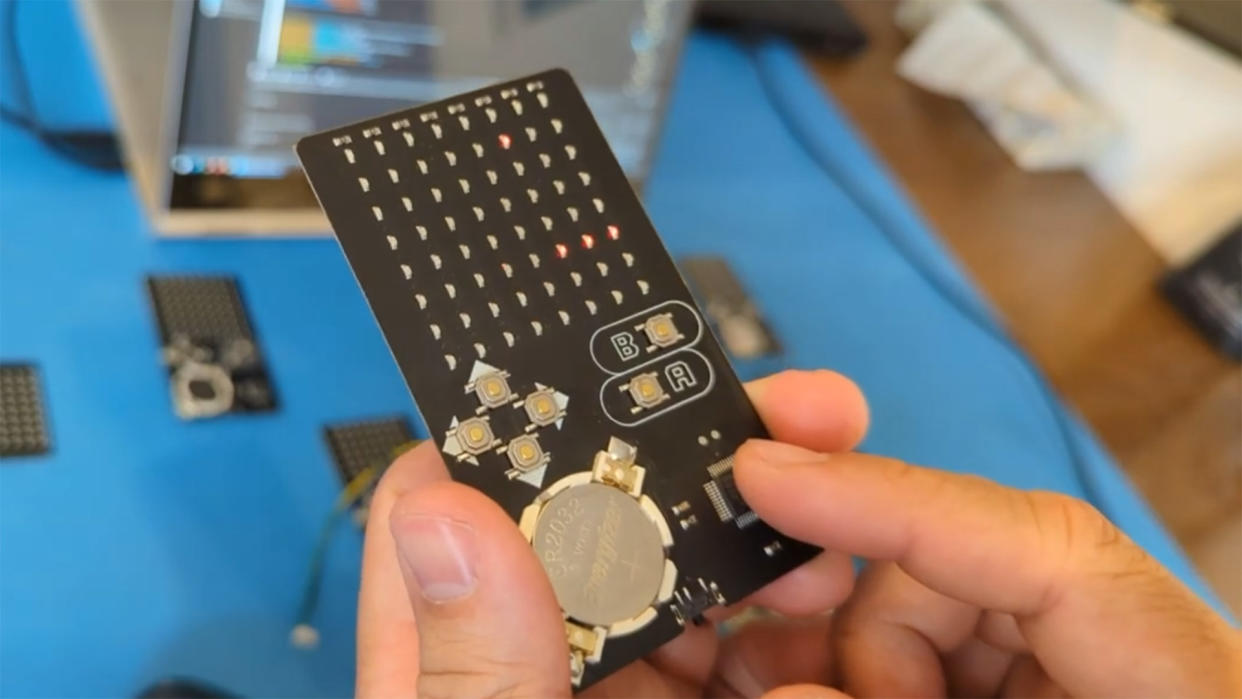  LambertTheMaker's business card/game console on Hackaday. 