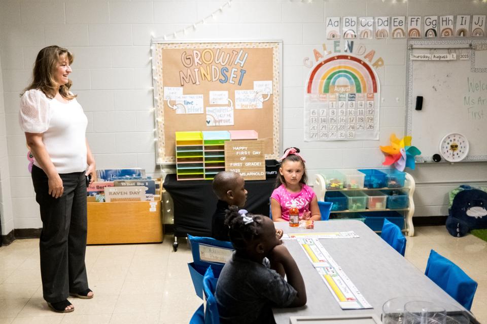 Maury County Schools Superintendent Lisa Ventura smiles as she greets children in Maggie Arnolds first grade class during the first day back at Riverside Elementary school in Columbia, Tenn. on Monday, Aug. 7, 2023.