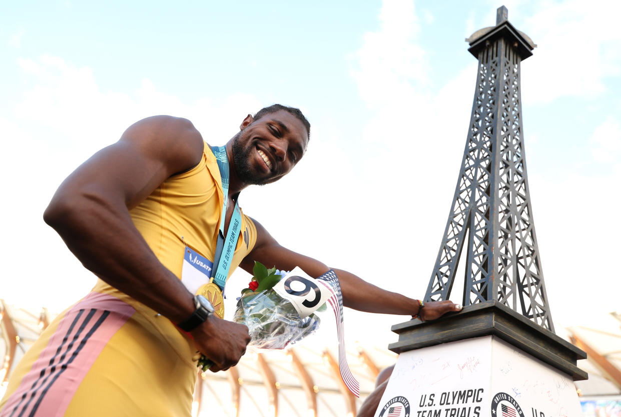 Lyles poses with a miniature Eiffel Tower after winning the 200m at U.S. Trials. (Christian Petersen/Getty Images)