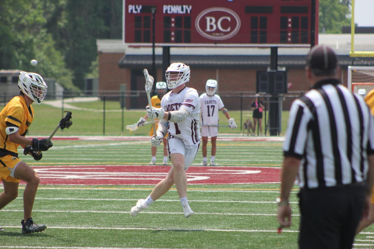 Benedictine's Liam Hogan dishes out an assist in the Cadets' win over Savannah Country Day on April 20, 2024.