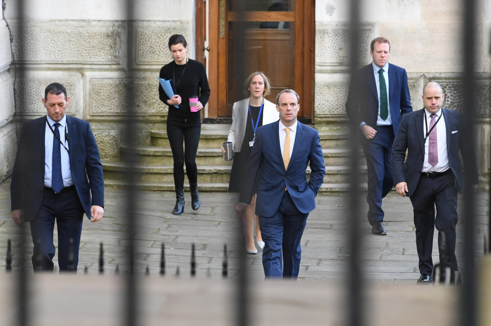 Foreign Secretary Dominic Raab (centre), who is taking charge of the Government's response to the coronavirus crisis after Prime Minister Boris Johnson was admitted to intensive care Monday, arrives at 10 Downing Street, London.