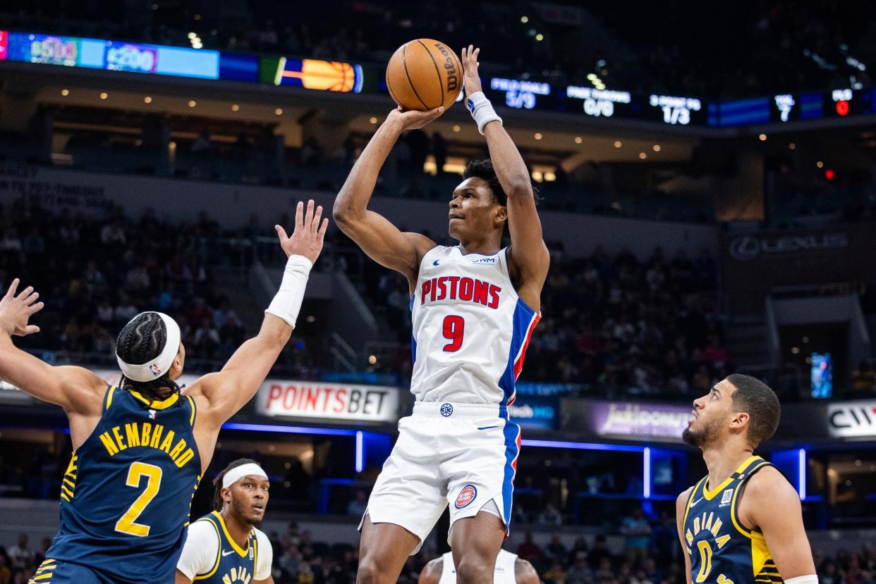 Pistons forward Ausar Thompson shoots the ball while Pacers guard Andrew Nembhard defends in the first half on Thursday, Feb. 22, 2024, in Indianapolis.