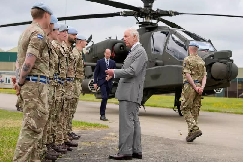 The King chatted to troops ( Image: PA) -Credit:PA
