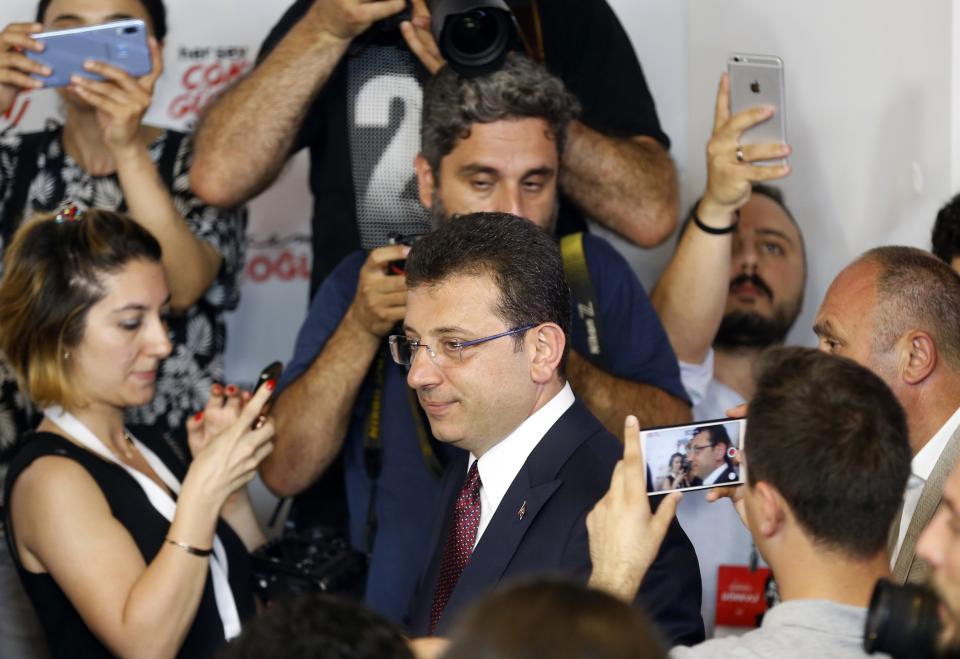 Ekrem Imamoglu candidate of the secular opposition Republican People's Party arrives for statements at CHP offices in Istanbul, Sunday, June 23, 2019. The opposition candidate declares second victory in Istanbul mayor's race, says democracy prevailed in rerun election. (AP Photo/Lefteris Pitarakis)