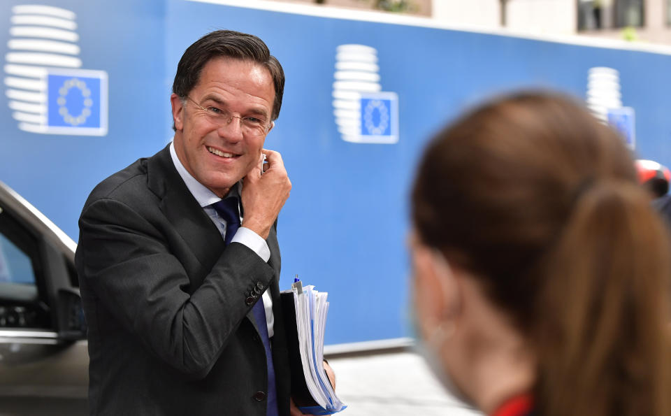 Dutch Prime Minister Mark Rutte arrives for an EU summit at the European Council building in Brussels, Sunday, July 19, 2020. Leaders from 27 European Union nations meet face-to-face for a third day to assess an overall budget and recovery package spread over seven years estimated at some 1.75 trillion to 1.85 trillion euros. (John Thys, Pool Photo via AP)