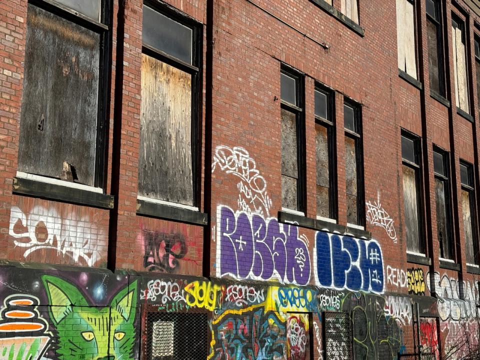 Boarded up windows at the former Bloomfield School in Halifax, N.S., pictured on Nov. 25, 2023.