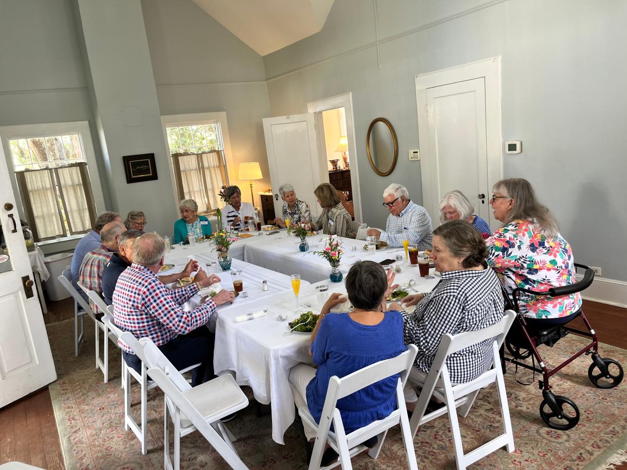 Hilda McCarter and her former students ate lunch and laughed over old memories and caught up on new ones at Goodwood's Laundry Cottage.