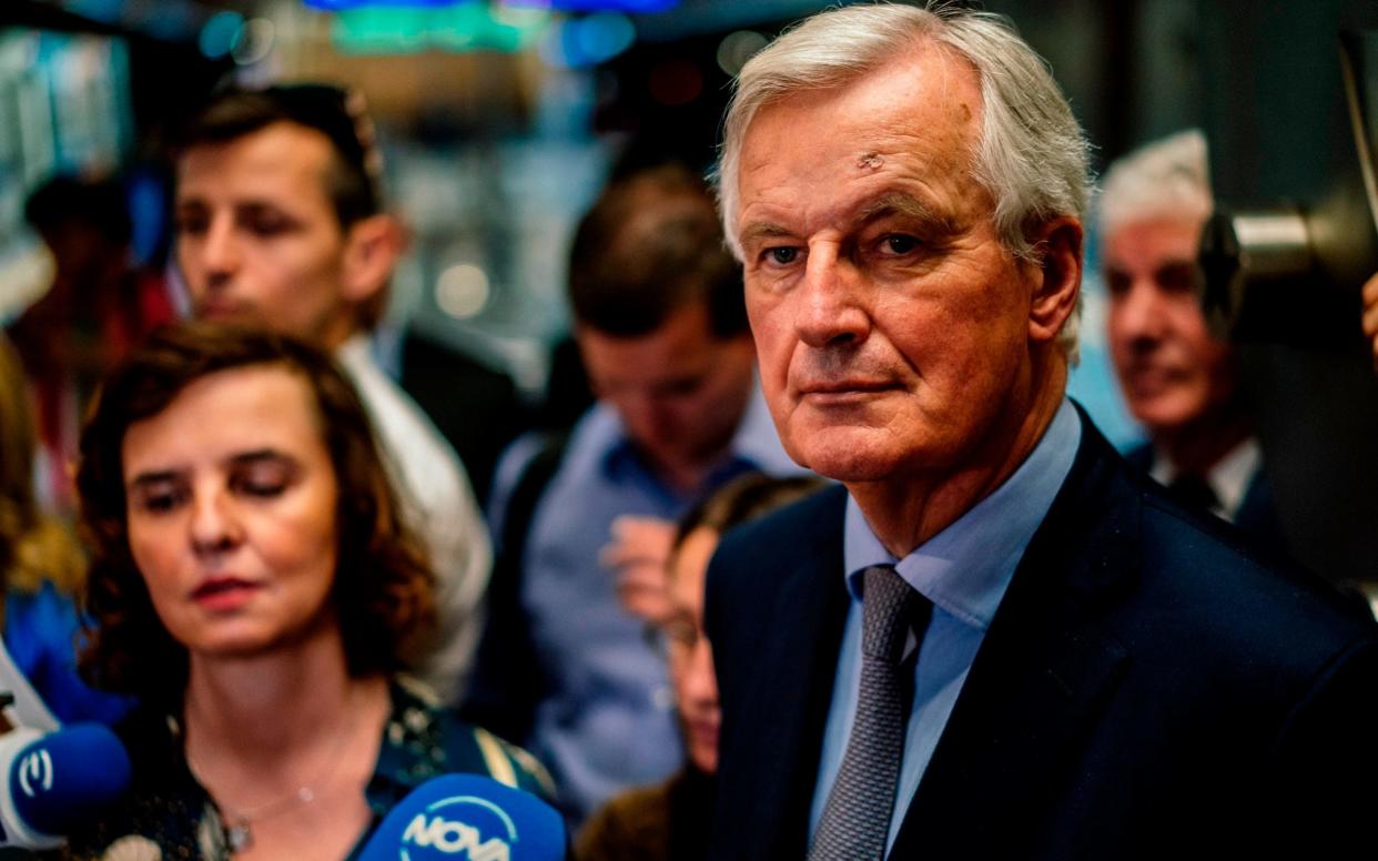 European Union negotiator Michel Barnier attends a news conference during his visit to the