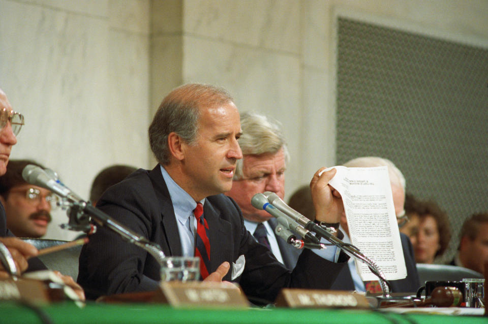 After Anita Hill accuses Clarence Thomas of sexual harassment, Biden presides over an all-white-male panel in the Senate in 1991 | Getty Images