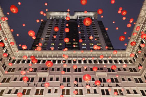 Festive lanterns at The Peninsula Hong Kong’s entrance (Peninsula Hong Kong)