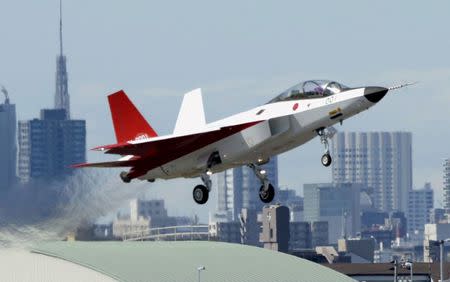 A prototype of the first Japan-made stealth fighter X-2 Shinshin, formerly called ATD-X, takes off to mark its maiden flight at Nagoya Airfield, also known as Komaki Airport, in Toyoyama town, Aichi prefecture, central Japan, in this photo taken by Kyodo April 22, 2016. Mandatory credit Kyodo/via REUTERS/File Photo