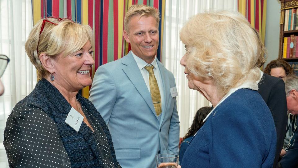 Queen Camilla talking to Jo Malone at MDD reception