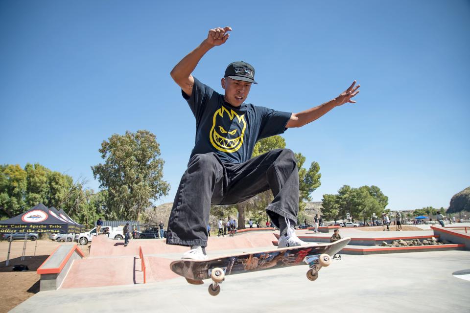 Douglas Miles Jr. performs a jump on his skateboard at the new San Carlos skate park on April 1, 2022. Miles was one of the primary consultants for the park.