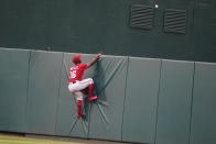 Washington Nationals center fielder Victor Robles can't reach a two-run home run hit by Atlanta Braves' Pablo Sandoval during the seventh inning of the second baseball game of a doubleheader at Nationals Park, Wednesday, April 7, 2021, in Washington.T he Braves won the second game 2-0. (AP Photo/Alex Brandon)