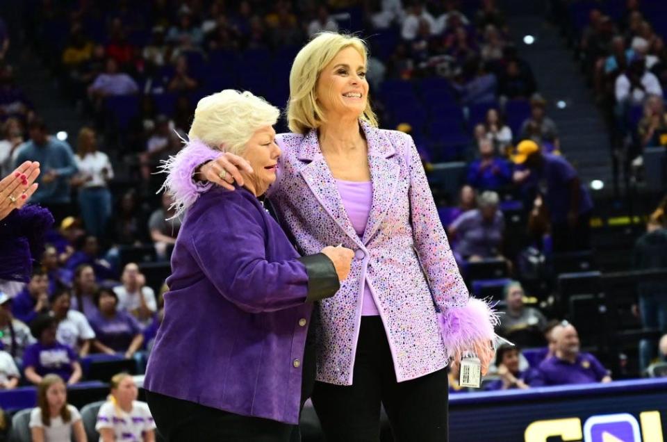 LSU women's basketball coach Kim Mulkey hugs her former coach at Louisiana Tech Sonja Hogg during a ceremony at halftime of the team's game against Mississippi Valley State Sunday, Nov. 12, 2023 inside the Pete Maravich Assembly Center.