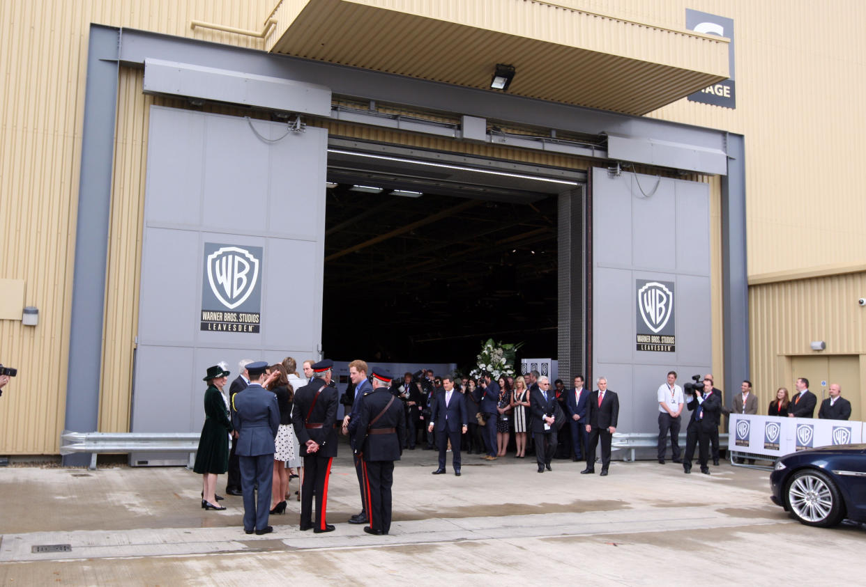 The Duke and Duchess of Cambridge with Prince Harry as they arrive for their visit to Warner Bros studios in Leavesden, Herts where the popular Harry Potter movies were produced.
