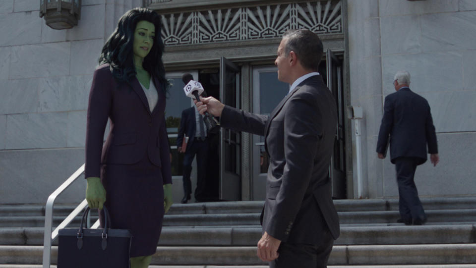 A reporter interviewing She-Hulk outside a courthouse in the She-Hulk: Attorney at Law finale