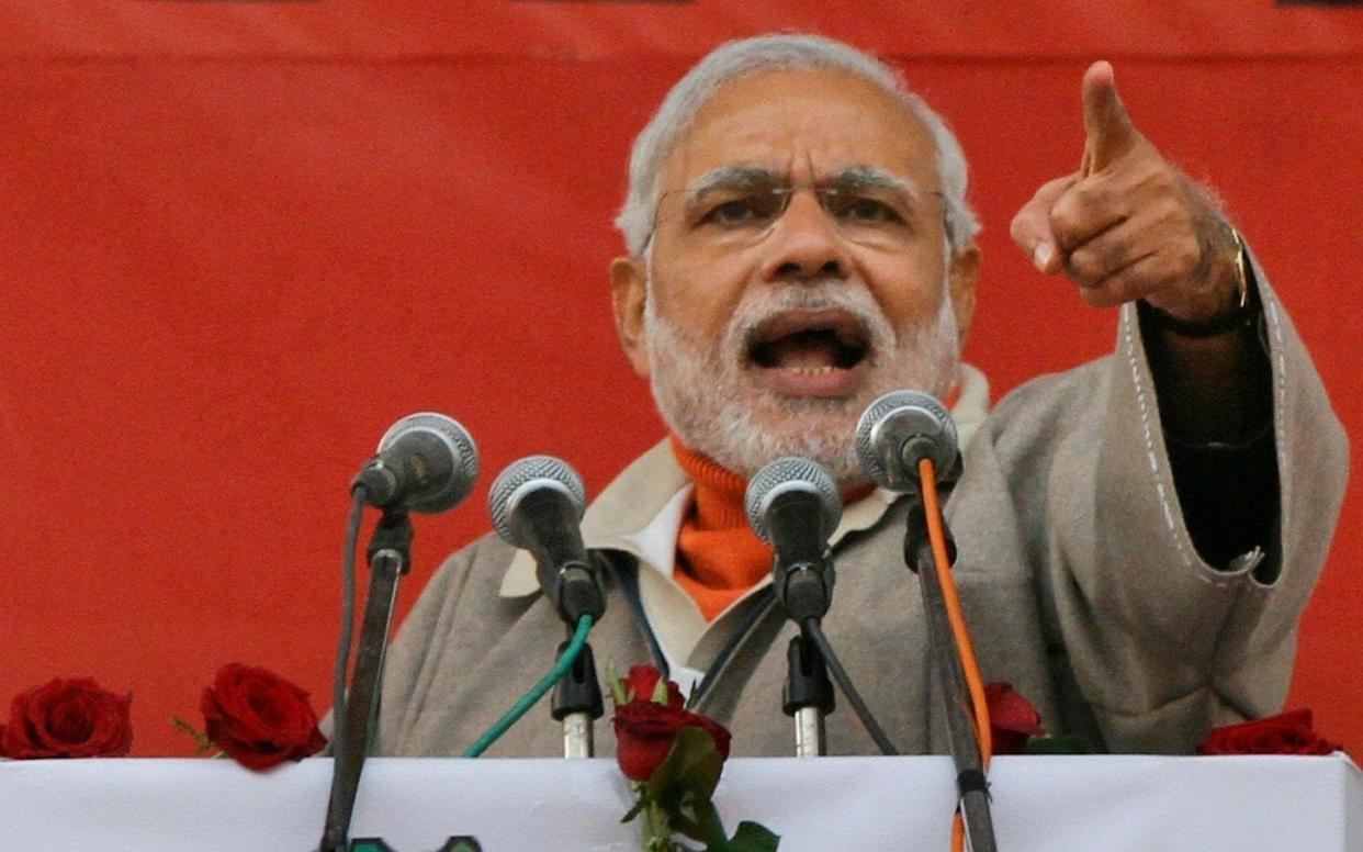 Mr Modi said the government’s decision 'will rid Jammu and Kashmir of terror and separatism' - AP