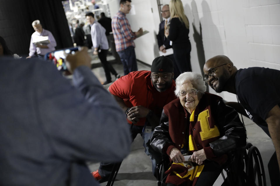 Sister Jean Dolores Schmidt poses with fans in Atlanta. (AP Photo/David Goldman)