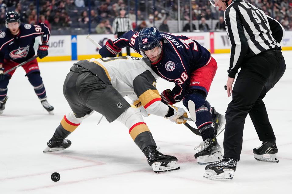 Mar 4, 2024; Columbus, Ohio, USA; Columbus Blue Jackets center Boone Jenner (38) takes a face off against Vegas Golden Knights center Jack Eichel (9) during the third period of the NHL hockey game at Nationwide Arena. The Blue Jackets won 6-3.