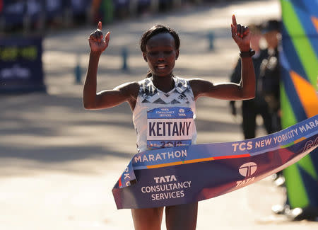 Athletics - New York City Marathon - New York City, New York, U.S. - November 4, 2018 Kenya's Mary Keitany crosses the finish line to win the Professional Women's race REUTERS/Brendan McDermid