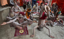 <p>Indian Sadhus or Hindu holy men perform Yoga to mark the International Yoga Day at Kamakhya temple in Gauhati, India, Wednesday, June 21, 2017. (Photo: Anupam Nath/AP) </p>