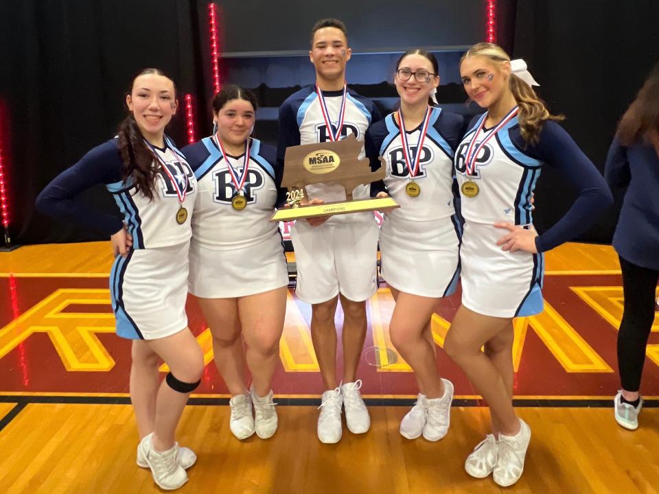 From left to right: Bristol-Plymouth cheerleading seniors Aryanna Haskell (co-captain), Lexie Jones (co-captain), Jayden Bastille, Emily Rouleau (co-captain) and Avery Blaser (co-captain) pose with the 2024 MSAA Game Day Winter State Championship trophy.