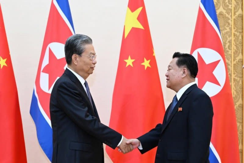 Zhao Leji (L), the third-highest ranking member of the Chinese Communist Party, is shown meeting on Friday with Choe Ryong Hae (R) of the Central Committee of the Workers' Party of Korea. The two nations are marking 75 years of bilateral diplomatic relations and pledging to further strengthen ties. Photo by Zhang Ling/EPA-EFE