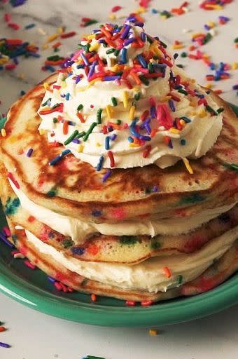 <p>This rainbow-explosion of pancakes features all our favourite parts of <a href="https://www.delish.com/uk/cooking/recipes/a32090325/funfetti-cake-birthday-cake-recipe/" rel="nofollow noopener" target="_blank" data-ylk="slk:classic birthday cake;elm:context_link;itc:0;sec:content-canvas" class="link ">classic birthday cake</a>; all you need to add is candles!</p><p>Get the <a href="https://www.delish.com/uk/cooking/recipes/a34725489/birthday-cake-pancakes-recipe/" rel="nofollow noopener" target="_blank" data-ylk="slk:Birthday Cake Pancakes;elm:context_link;itc:0;sec:content-canvas" class="link ">Birthday Cake Pancakes</a> recipe.</p>