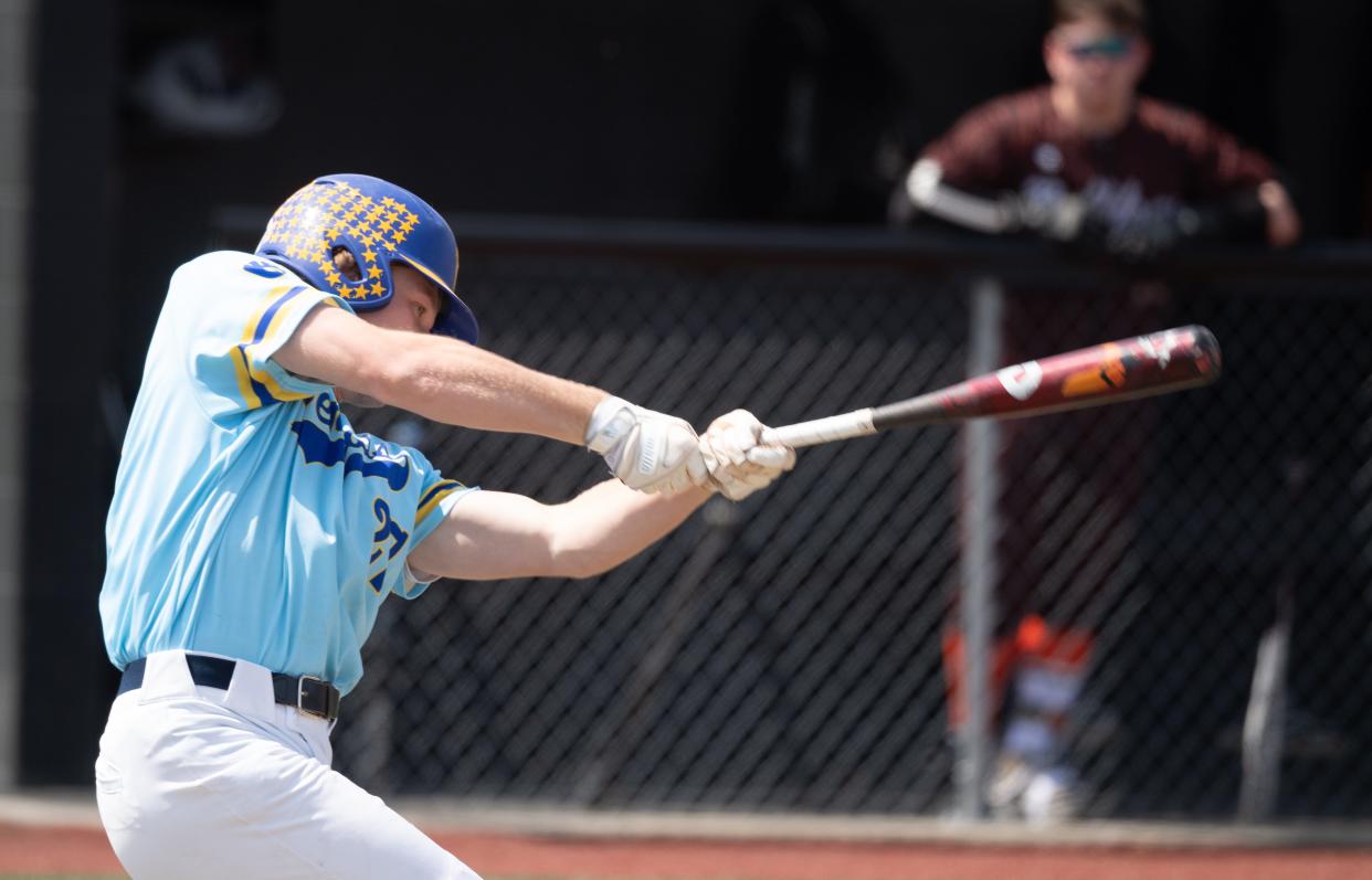 Blake Bowen cranks a towering triple into deep center field.