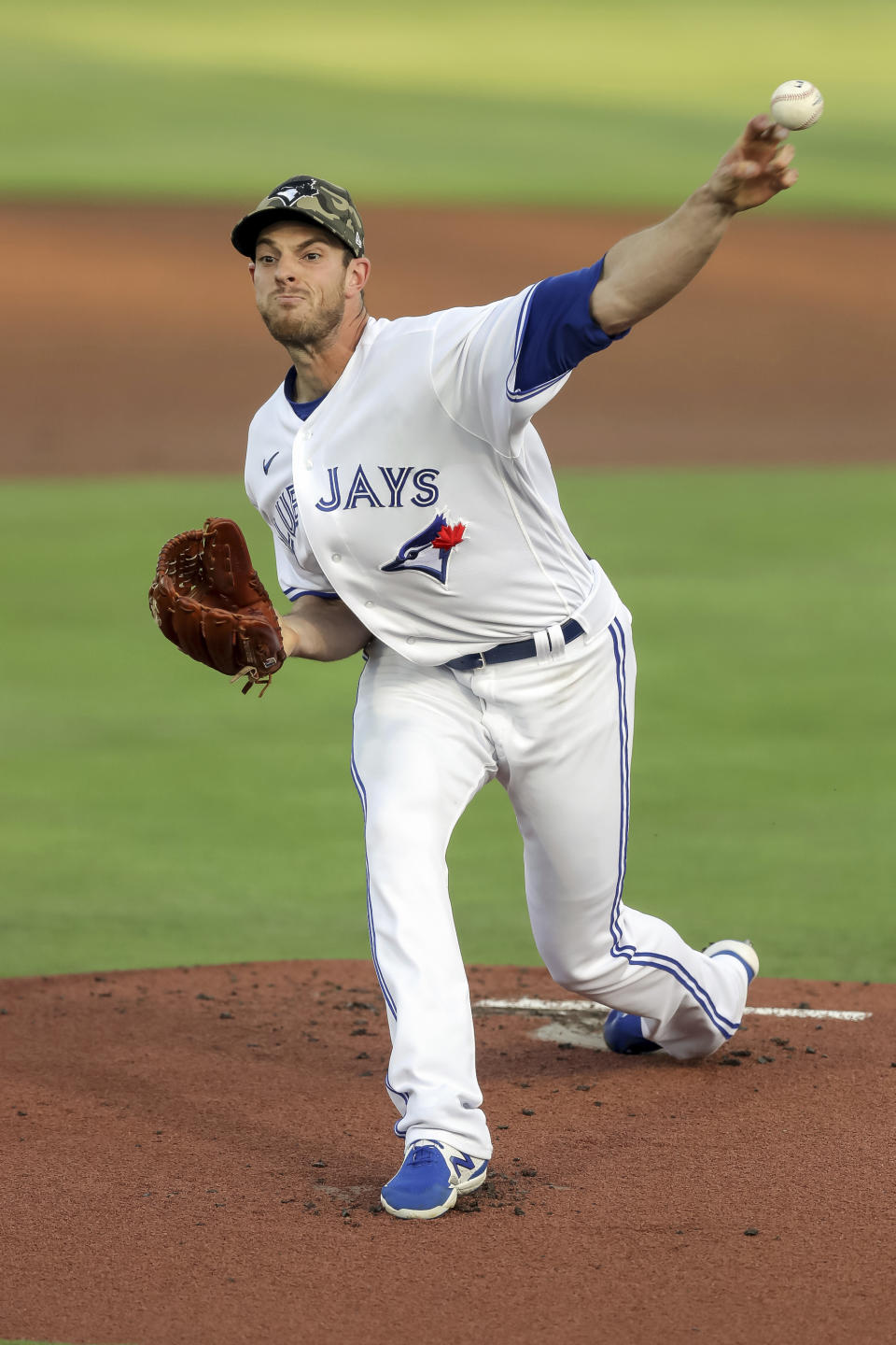 Toronto Blue Jays starting pitcher Steven Matz throws to a Philadelphia Phillies batter during the first inning of a baseball game Friday, May 14, 2021, in Dunedin, Fla. (AP Photo/Mike Carlson)