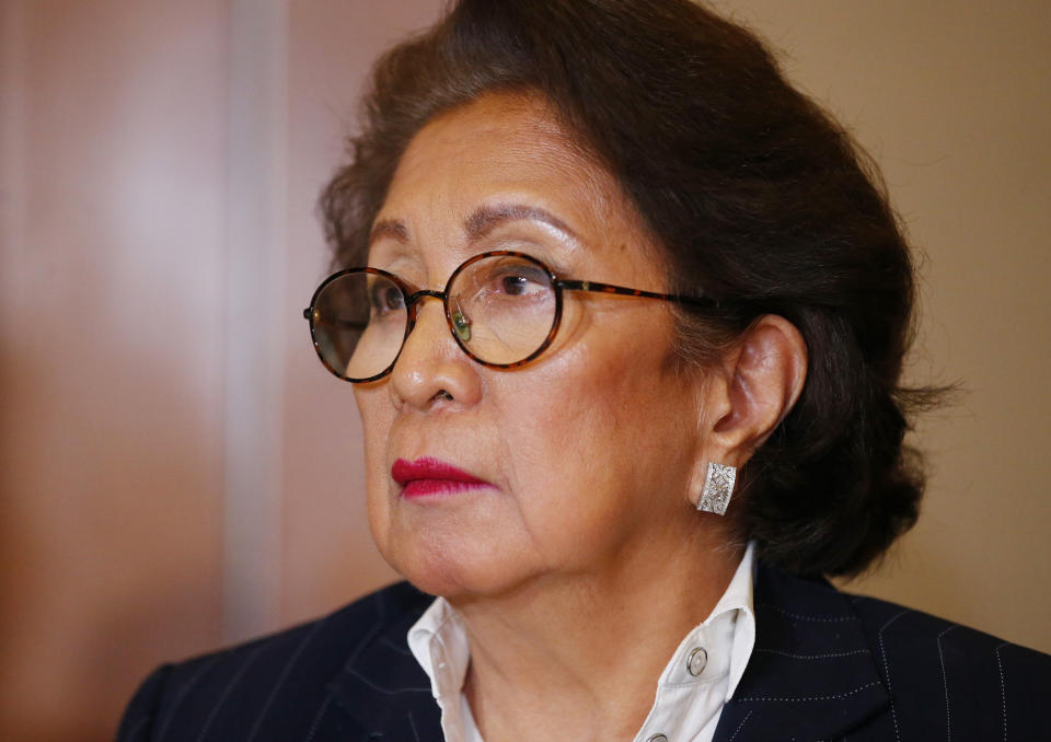 FILE - In this March 22, 2019, file photo, Philippine Supreme Court justice Conchita Carpio-Morales listens to a question during a news conference in Manila, Philippines. Carpio-Morales, who accused Chinese President Xi Jinping of crimes against humanity before the International Criminal Court, says she has been barred four hours from entering Hong Kong for unspecified reasons. (AP Photo/Bullit Marquez, File)