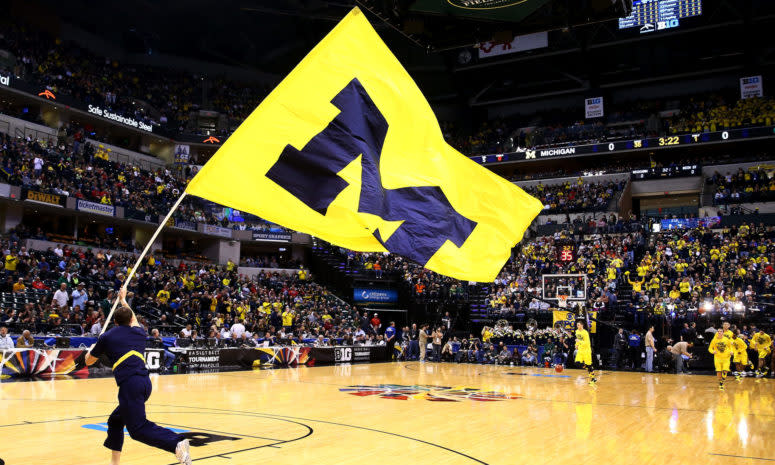 A University of Michigan flag is seen on the court prior to the 2014 Big Ten Men's Championship between the Michigan Wolverines and the Michigan State Spartans.