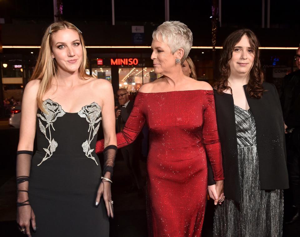 Annie Guest, Jamie Lee Curtis, and Ruby Guest enter the "Halloween Ends" premiere.