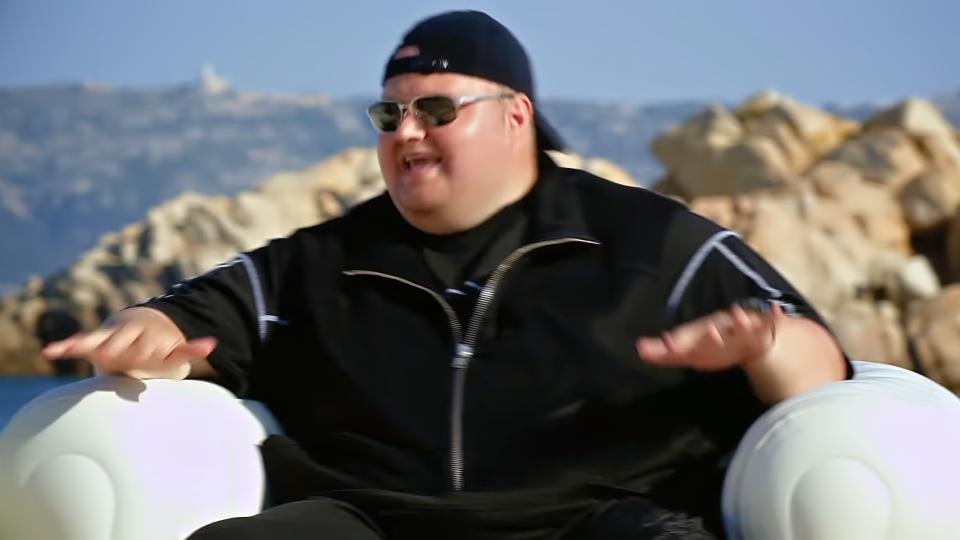 Kim Dotcom in a comfortable water vehicle.