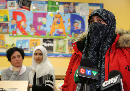 Saima Samad, mother of Khawlah Noman, 11, speaks to reporters at Pauline Johnson Junior Public School, after her daughter's hijab was cut in Toronto, Ontario, Canada January 12, 2018. REUTERS/Chris Helgren